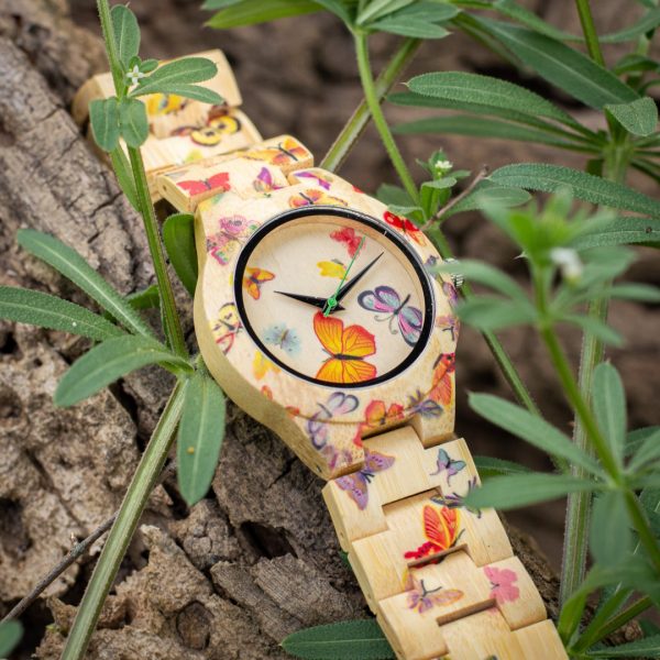 Reloj de madera de bambú decorada Capri